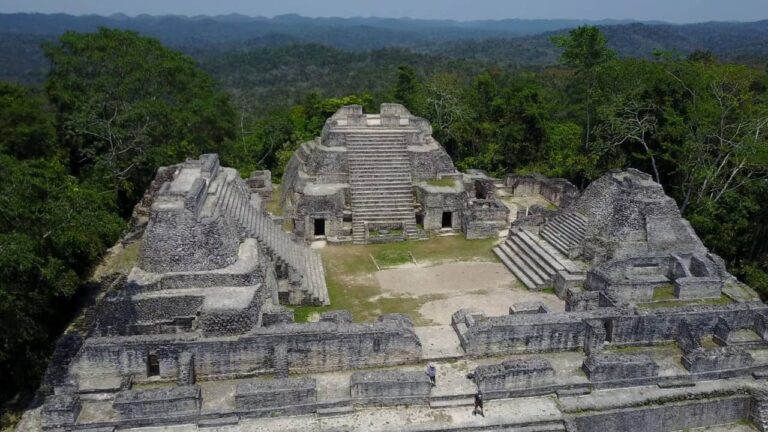 aerial photo of mayan temples at caracol maya city in belize